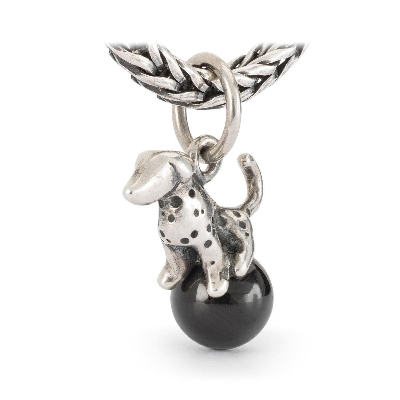 Jewellery silver pendant of a dalmation dog on a ball of Black Onyx gemstone.