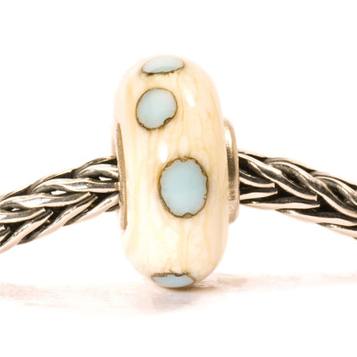 Beige/blå plet kugle